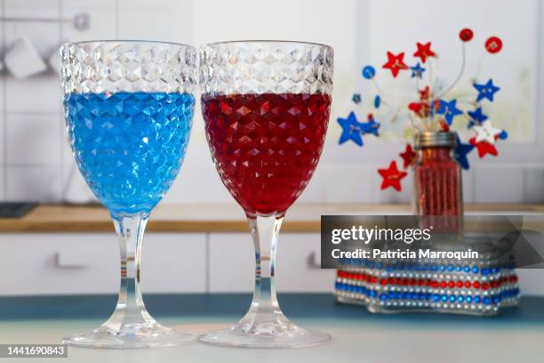 blue and red wineglasses - political party stock pictures, royalty-free photos & images