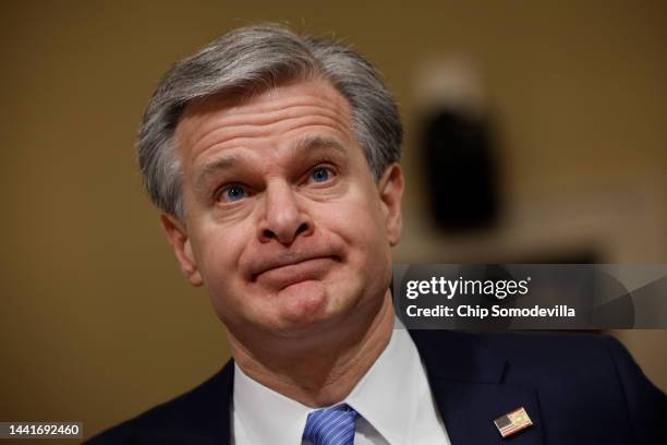 Federal Bureau of Investigation Director Christopher Wray prepares to testify before the House Homeland Security Committee in the Cannon House Office...