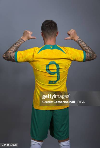 Jamie Maclaren of Australia poses during the official FIFA World Cup Qatar 2022 portrait session on November 15, 2022 in Doha, Qatar.