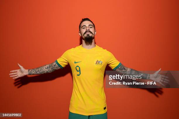 Jamie Maclaren of Australia poses during the official FIFA World Cup Qatar 2022 portrait session on November 15, 2022 in Doha, Qatar.