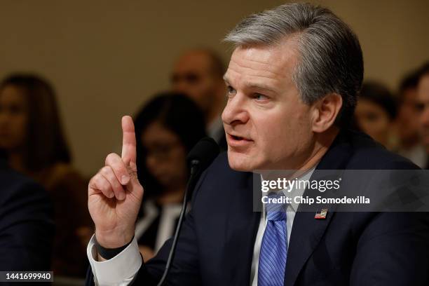 Federal Bureau of Investigation Director Christopher Wray prepares to testify before the House Homeland Security Committee in the Cannon House Office...