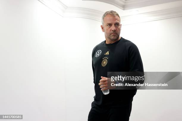 Hans-Dieter Flick, head Coach of Germany looks on after a Germany press conference at Sultan Qaboos Sports Complex on November 15, 2022 in Muscat,...