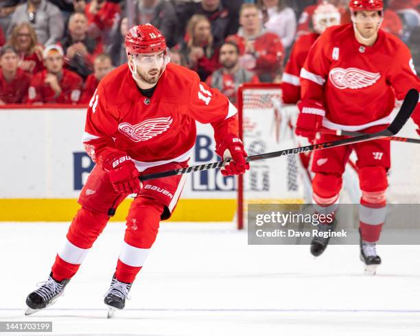 Filip Zadina of the Detroit Red Wings follows the play against the New York Islanders during the first period of an NHL game at Little Caesars Arena...