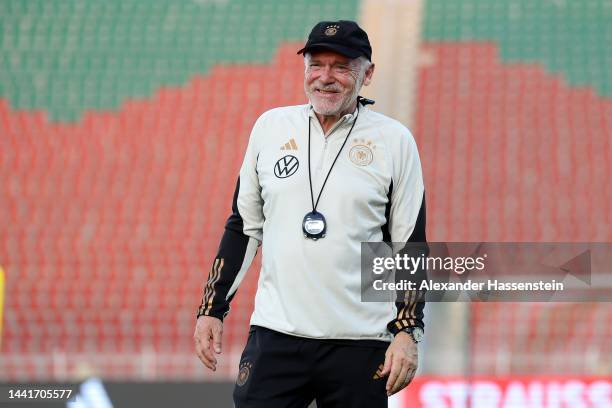 Assistent Coach Hermann Gerland of Germany looks on during the Germany training session at Sultan Qaboos Sports Complex on November 15, 2022 in...