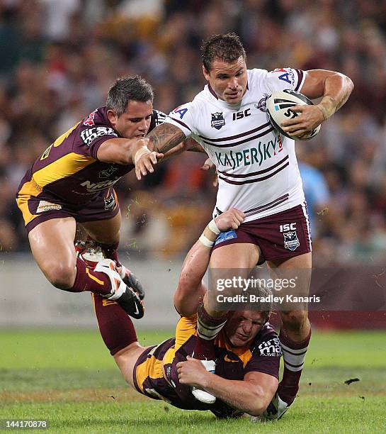 Anthony Watmough of the Sea Eagles attempts to push through the defence during the round 10 NRL match between the Brisbane Broncos and the Manly Sea...