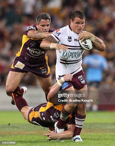 Anthony Watmough of the Sea Eagles attempts to push through the defence during the round 10 NRL match between the Brisbane Broncos and the Manly Sea...