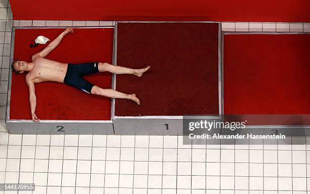 Eric Reuss reacts after competing in his 200m freestyle head during day two of the German Swimming Championships 2012 at the Eurosportpark on May 11,...