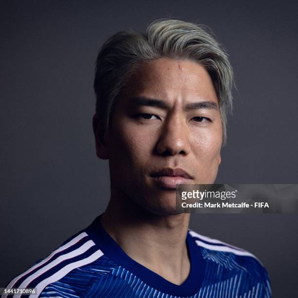 Takuma Asano of Japan poses for a portrait during the official FIFA World Cup Qatar 2022 portrait session on November 15, 2022 in Doha, Qatar.