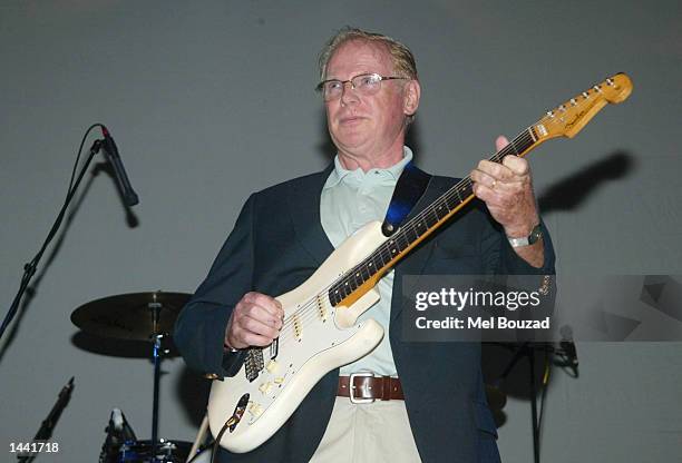 Session guitarist Vic Flick performs with tribute band The Fab Four at the House of Blues club, celebrating the 40th anniversary of the Beatles and...