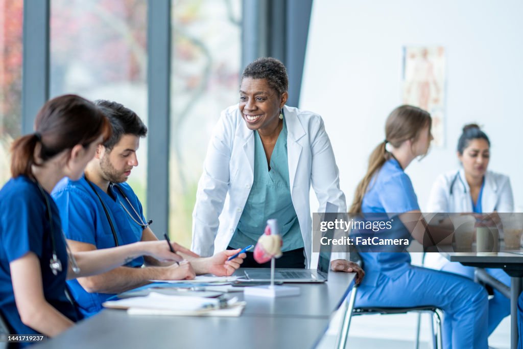 Medical Instructor Medical Professor With Students In Class High-Res Stock Photo - Getty ...