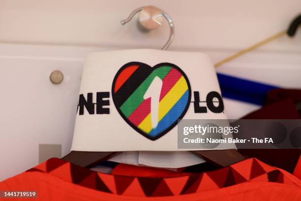 The captain's armband is seen with the shirt of Millie Bright in the England dressing room prior to the International Friendly between England and...