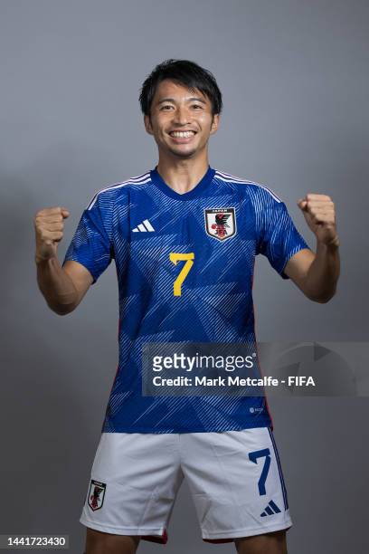 Gaku Shibasaki of Japan poses during the official FIFA World Cup Qatar 2022 portrait session on November 15, 2022 in Doha, Qatar.