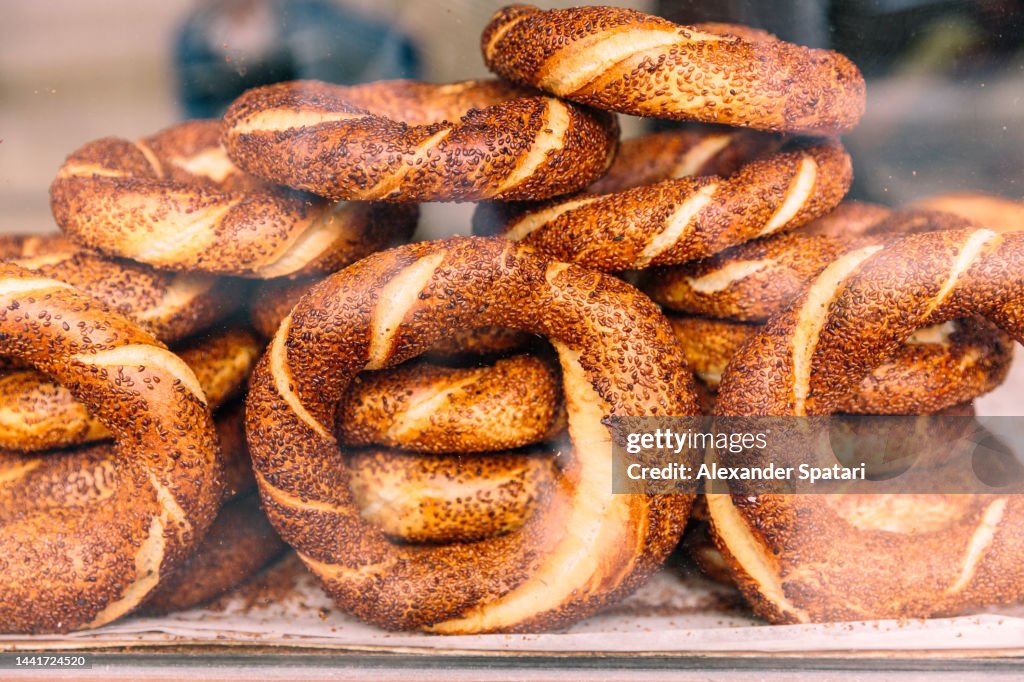 Stacks of Turkish bagels or Simits with sesame seeds for sale, Istanbul, Turkey