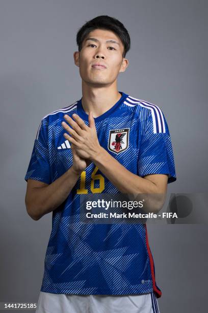 Takehiro Tomiyasu of Japan poses during the official FIFA World Cup Qatar 2022 portrait session on November 15, 2022 in Doha, Qatar.