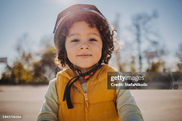 portrait of a boy with a helmet - kids laughing close up bildbanksfoton och bilder