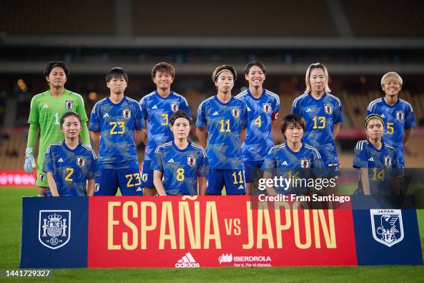 Players of Japan pose for a team photo during an International Friendly match between Spain and Japan at Estadio de La Cartuja on November 15, 2022...