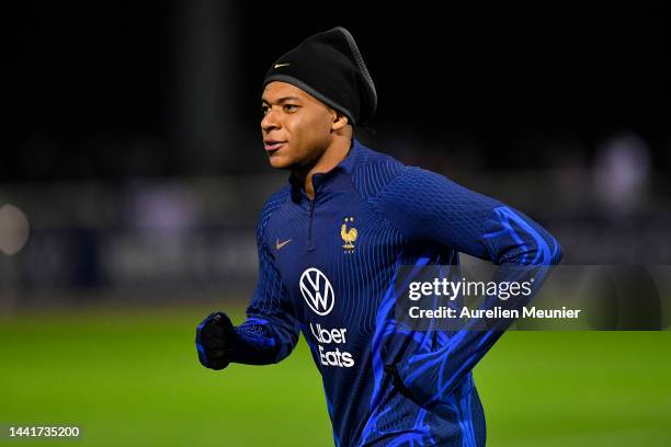 Kylian Mbappe warms up during a Team France training session at Centre National du Football on November 15, 2022 in Etival-Clairefontaine, France.