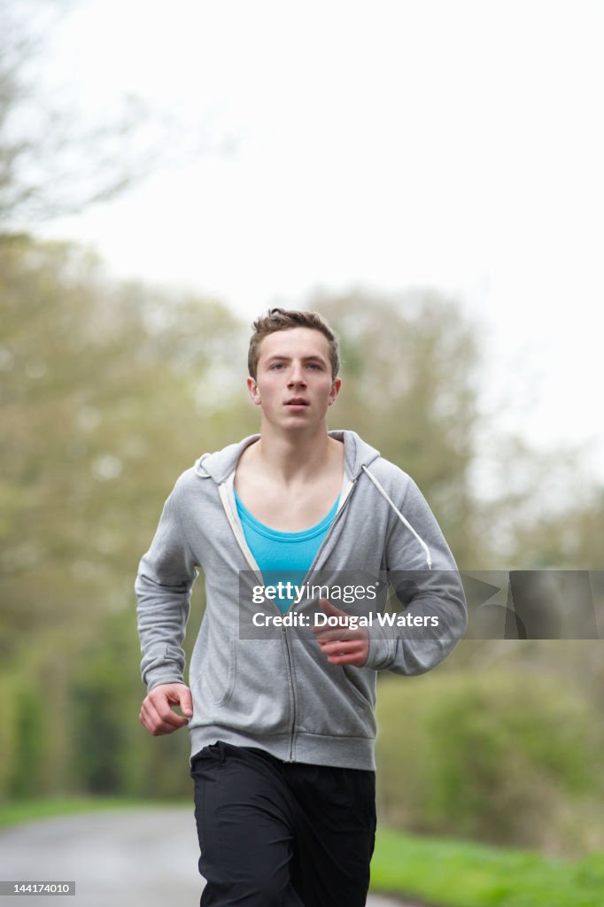 Man running in countryside.