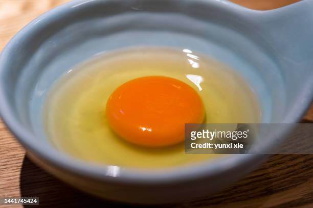 sterile eggs on a plate - salmonella fotografías e imágenes de stock