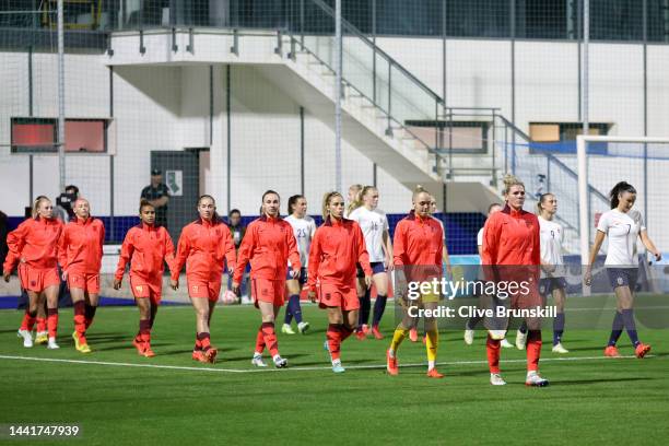 Millie Bright of England leads teammates onto the pitch prior to the International Friendly between England and Norway at Pinatar Arena on November...