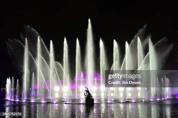 The Palm House at Kew Gardens is illuminated with a light show during a preview for the Christmas at Kew event on November 15, 2022 in London,...