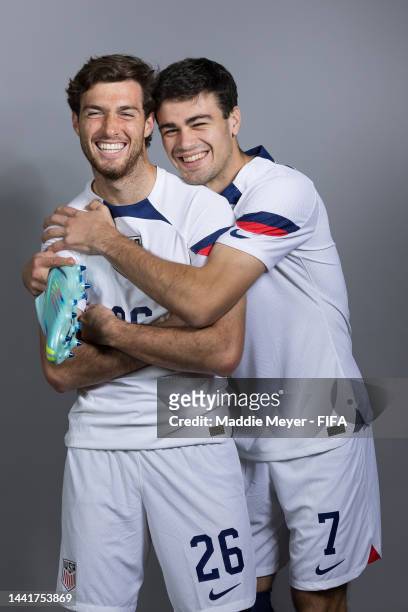 Joe Scally and Giovanni Reyna of United States pose during the official FIFA World Cup Qatar 2022 portrait session at on November 15, 2022 in Doha,...