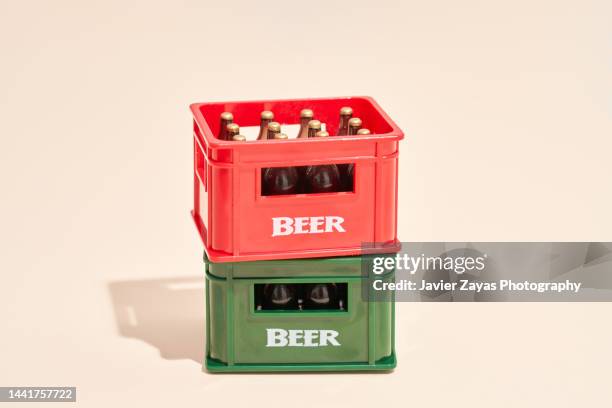 two plastic crates with beer bottles - artisanal food and drink stockfoto's en -beelden