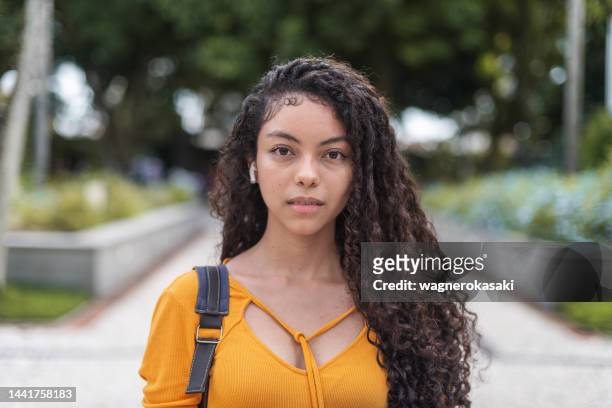 outdoor portrait of a female university student - 19 years stock pictures, royalty-free photos & images