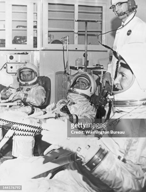 The Apollo 7 prime crew members during a training session, 17th May 1967. From left to right, they are Command Module Pilot Donn F. Eisele, Lunar...