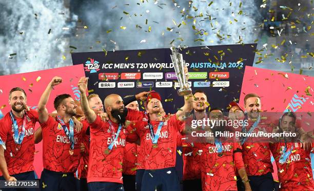 Jos Buttler of England holds up the trophy with team mates after the ICC Men's T20 World Cup Final match between Pakistan and England at the...