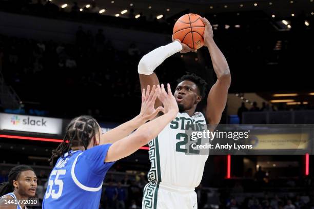 Mady Sissoko of the Michigan State Spartans takes a shot over Lance Ware of the Kentucky Wildcats during the first half during the Champions Classic...