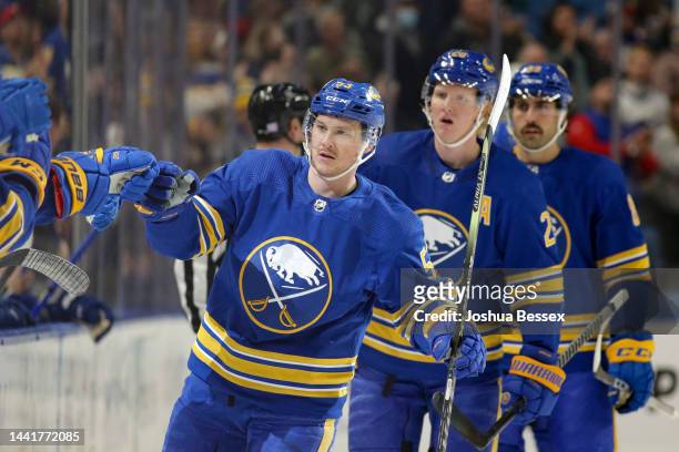 Jeff Skinner of the Buffalo Sabres celebrates with teammates on the bench after scoring a goal during the first period of an NHL hockey game against...
