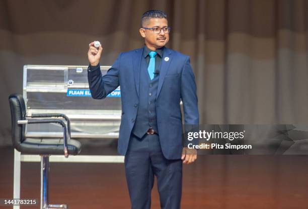 Supervisor of Elections Mohammed Saneem calls out candidates' three-digit numbers for use on the ballot at the Suva Civic Centre Auditorium on...