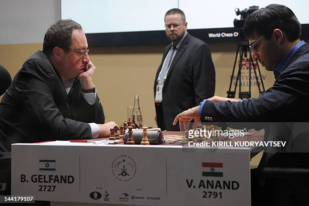 India's Vishwanathan Anand and Israel's Boris Gelfand play a FIDE World chess championship match in State Tretyakovsky Gallery in Moscow on May 11,...