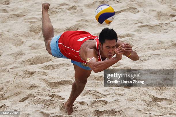 Shun Zhou of China in action during the 2012 Swatch FIVB World Tour Beijing Grand Slam Pool Q match against Benjamin Insfran and Bruno Oscar Schmidt...