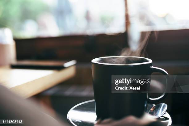 hot cup of coffee - black mug stock pictures, royalty-free photos & images