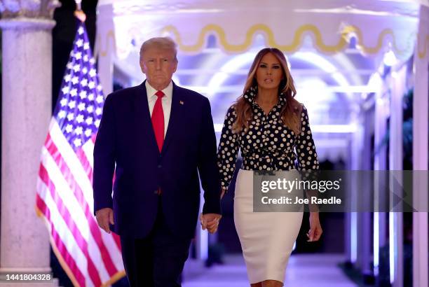 Former U.S. President Donald Trump and former first lady Melania Trump arrive for an event at his Mar-a-Lago home on November 15, 2022 in Palm Beach,...