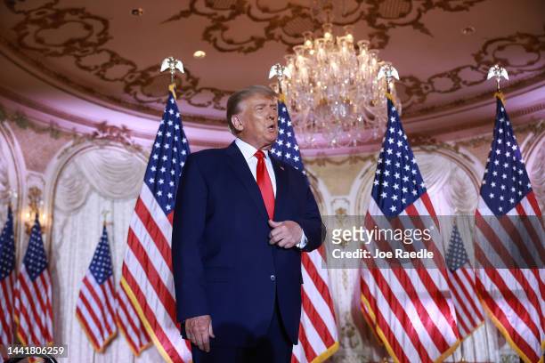 Former U.S. President Donald Trump arrives on stage to speak during an event at his Mar-a-Lago home on November 15, 2022 in Palm Beach, Florida....