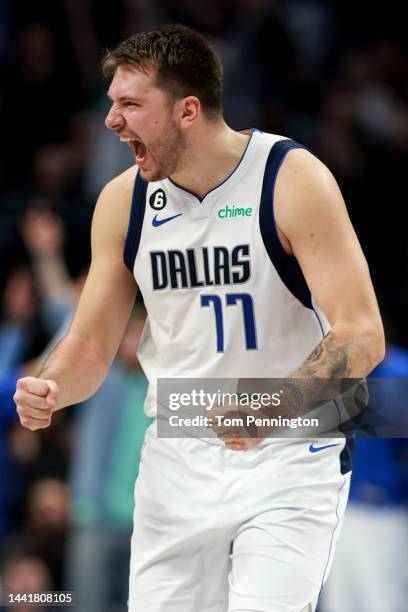 Luka Doncic of the Dallas Mavericks celebrates after Spencer Dinwiddie of the Dallas Mavericks hits a three-point shot against the LA Clippers in the...