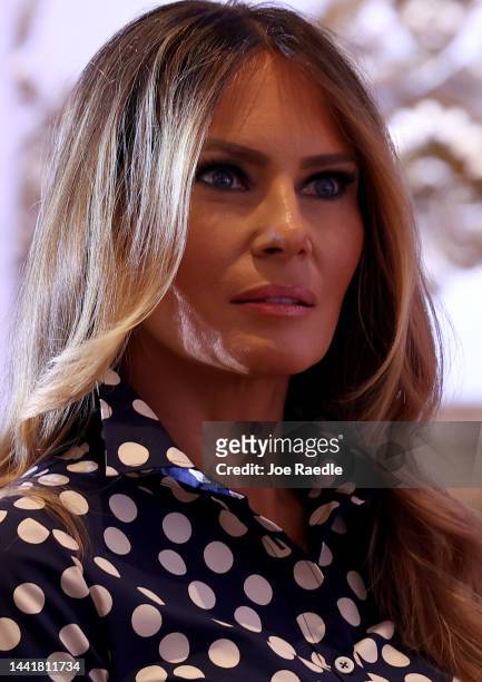 Former first lady Melania Trump listens as former U.S. President Donald Trump speaks during an event at his Mar-a-Lago home on November 15, 2022 in...