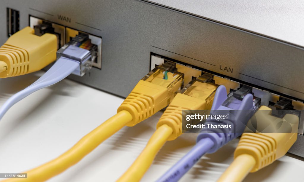 Ethernet Cables Connected To A Computer Network High-Res Stock Photo ...