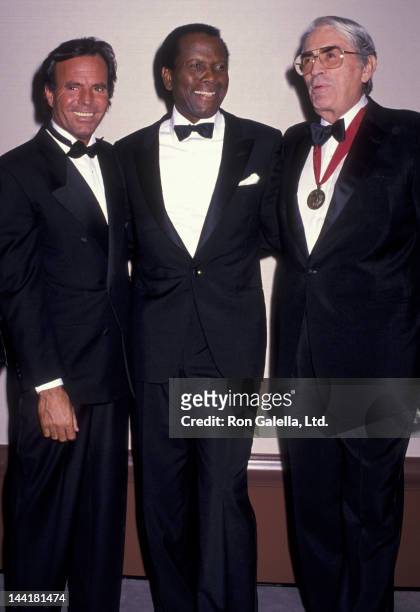 Julio Iglesias, Sidney Poitier and Gregory Peck attend Scopus Awards Gala on January 15, 1989 at the Beverly Hilton Hotel in Beverly Hills,...