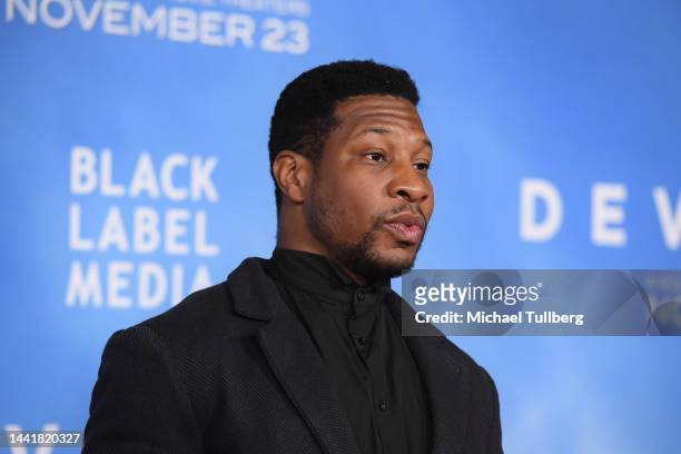 Actor Jonathan Majors attends the Los Angeles premiere of "Devotion" at Regency Village Theatre on November 15, 2022 in Los Angeles, California.