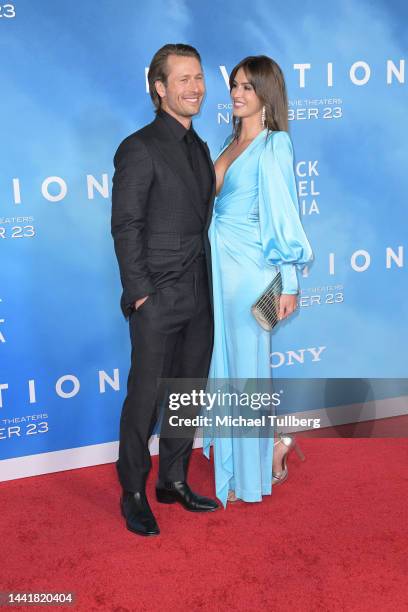 Actor Glen Powell and model Gigi Paris attend the Los Angeles premiere of "Devotion" at Regency Village Theatre on November 15, 2022 in Los Angeles,...