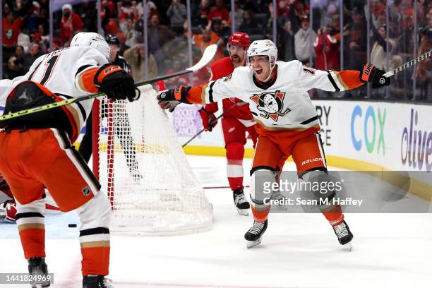 Ryan Strome reacts with Trevor Zegras of the Anaheim Ducks after scoring the winning goal during overtime of a game against the Detroit Red Wings at...