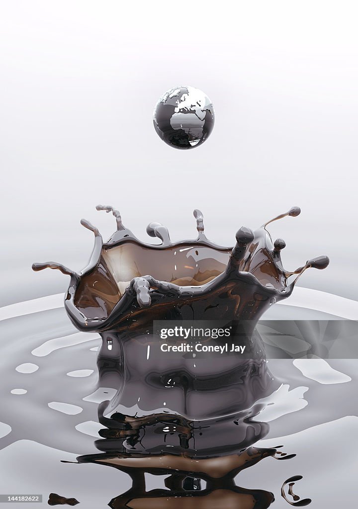 CGI globe droplet splashing in crude oil