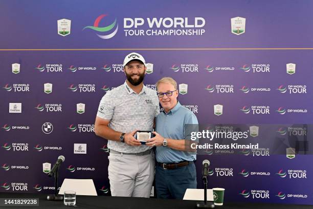 Jon Rahm of Spain receives the honorary life membership to the DP World Tour from the CEO of The European Tour Group Keith Pelley prior to the DP...