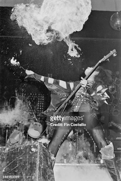 Bassist Gene Simmons of American heavy metal group Kiss adds fire-eating to the group's performance at the Calderone Theater, New York, 24th August...