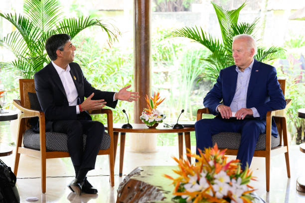 British Prime Minister Rishi Sunak speaks with U.S. President Joe Biden during a bilateral meeting at the G20 summit on November 16, 2022 in Nusa...