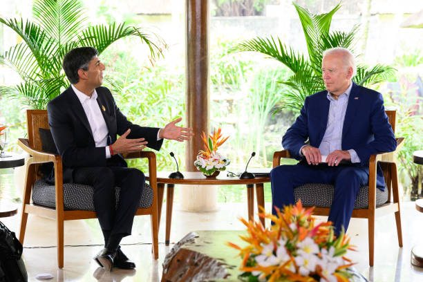 British Prime Minister Rishi Sunak speaks with U.S. President Joe Biden during a bilateral meeting at the G20 summit on November 16, 2022 in Nusa...